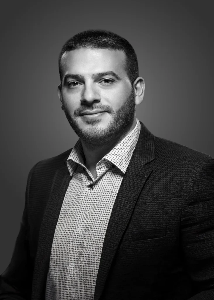 Man in suit portrait, grayscale photo