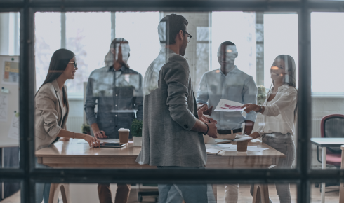 professionals-collaborating-at-table-in-brightly-l-2026-03-19-06-55-02-utc (1)